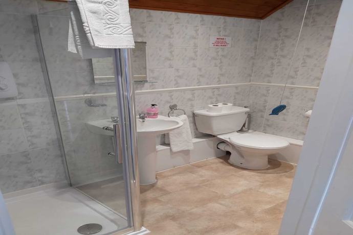 Imagen de la habitación del Hotel OYO Pier. Foto 18