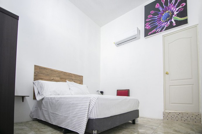 Imagen de la habitación del Hotel OYO Plaza Las Torres, Cabo San Lucas. Foto 5