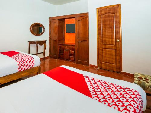 Imagen de la habitación del Hotel OYO Posada De Los Angeles, P&aacute;tzcuaro. Foto 17