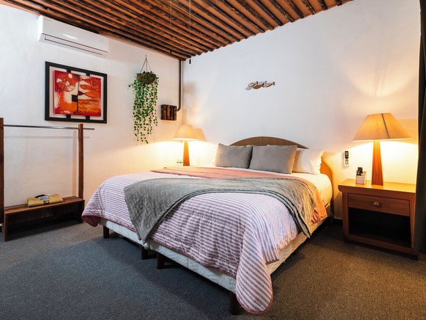 Imagen de la habitación del Hotel OYO Posada Del Pescador. Foto 3