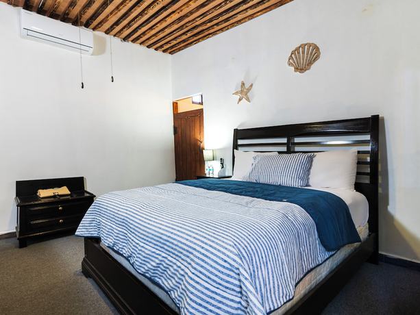 Imagen de la habitación del Hotel OYO Posada Del Pescador. Foto 6