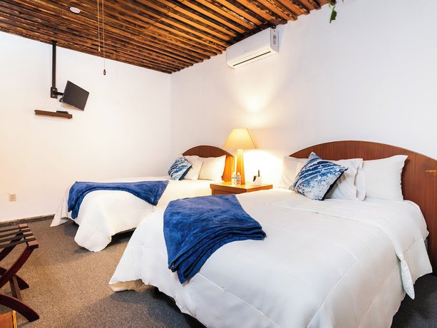 Imagen de la habitación del Hotel OYO Posada Del Pescador. Foto 7