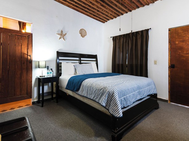 Imagen de la habitación del Hotel OYO Posada Del Pescador. Foto 11