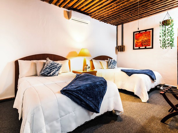Imagen de la habitación del Hotel OYO Posada Del Pescador. Foto 12