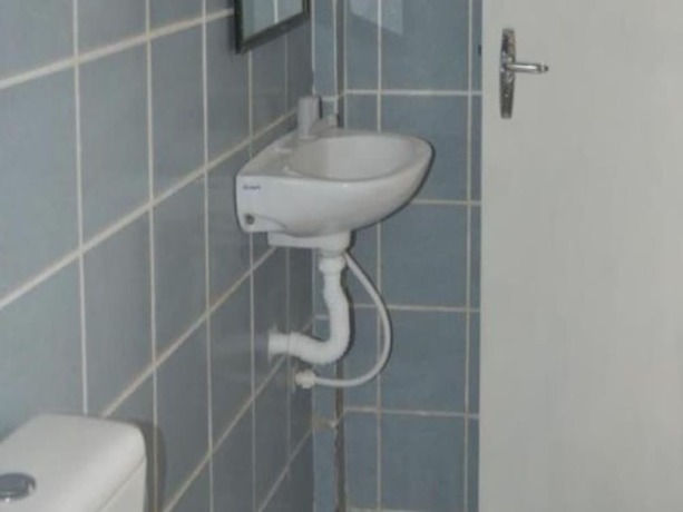 Imagen de la habitación del Hotel OYO Pousada Brisa de Saquarema. Foto 8