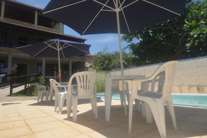 Imagen de la piscina del Hotel OYO Pousada Brisa de Saquarema. Foto 19
