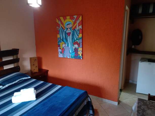 Imagen de la habitación del Hotel OYO Pousada Luar da Serra Lumiar. Foto 7