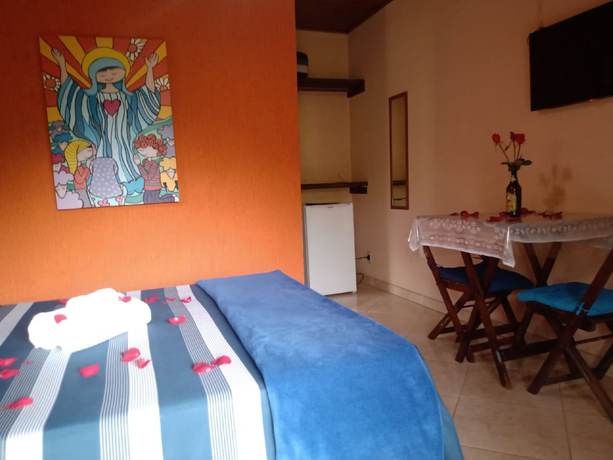 Imagen de la habitación del Hotel OYO Pousada Luar da Serra Lumiar. Foto 8