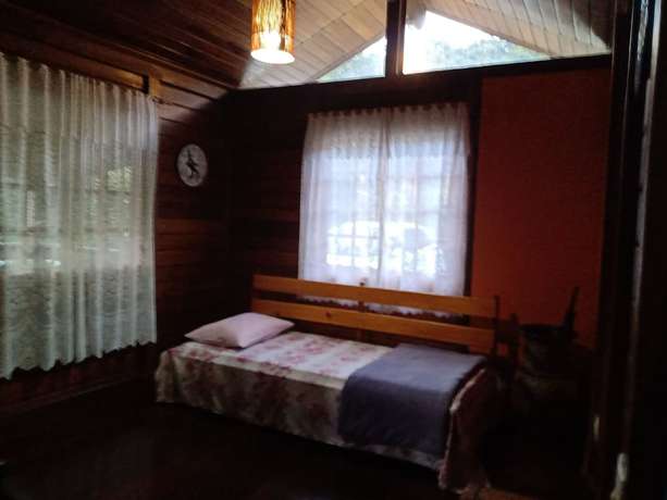 Imagen de la habitación del Hotel OYO Pousada Luar da Serra Lumiar. Foto 9