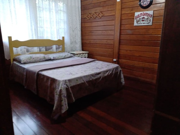 Imagen de la habitación del Hotel OYO Pousada Luar da Serra Lumiar. Foto 10