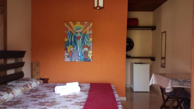 Imagen de la habitación del Hotel OYO Pousada Luar da Serra Lumiar. Foto 11