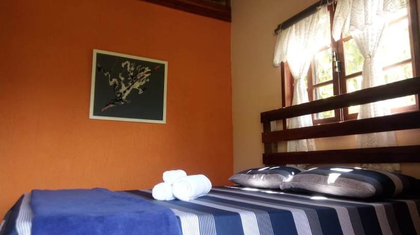 Imagen de la habitación del Hotel OYO Pousada Luar da Serra Lumiar. Foto 12
