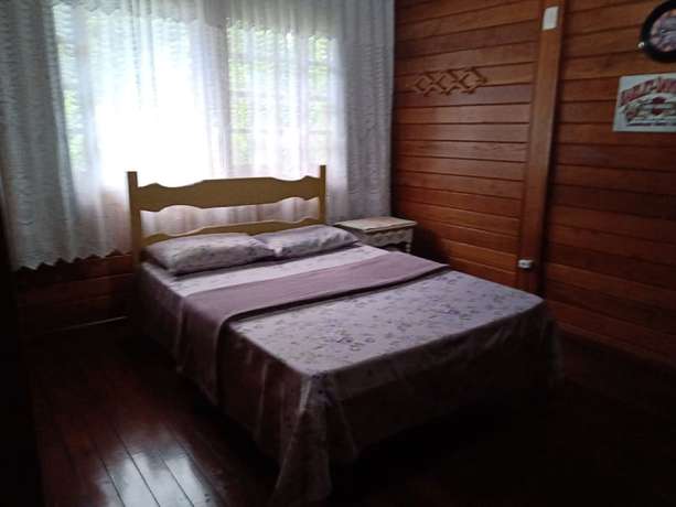Imagen de la habitación del Hotel OYO Pousada Luar da Serra Lumiar. Foto 15