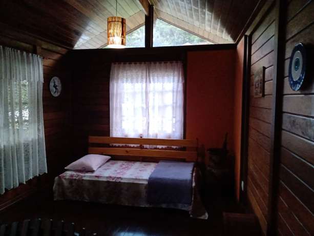 Imagen de la habitación del Hotel OYO Pousada Luar da Serra Lumiar. Foto 17