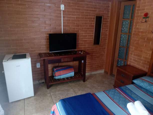 Imagen de la habitación del Hotel OYO Pousada Luar da Serra Lumiar. Foto 20