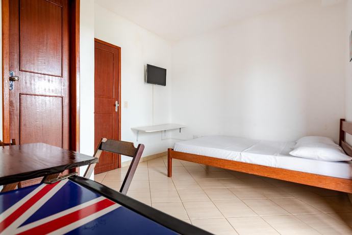 Imagen de la habitación del Hotel OYO Pousada Para&iacute;so. Foto 8
