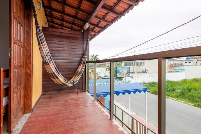 Imagen de la habitación del Hotel OYO Pousada Para&iacute;so. Foto 9