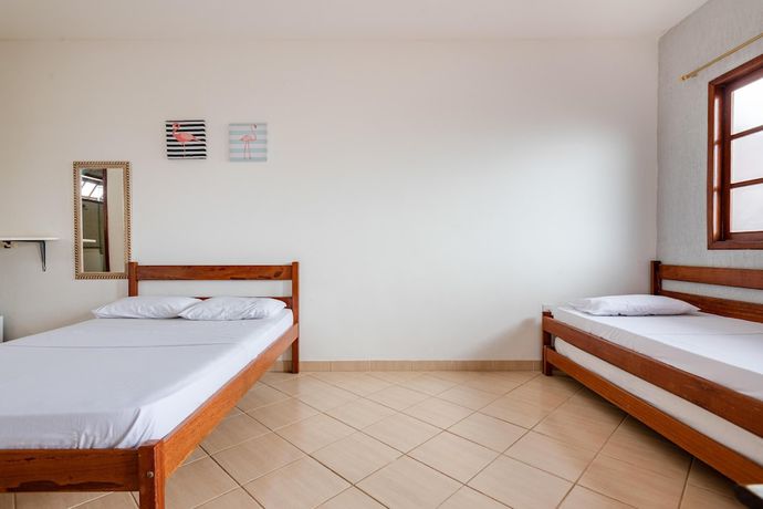 Imagen de la habitación del Hotel OYO Pousada Para&iacute;so. Foto 10