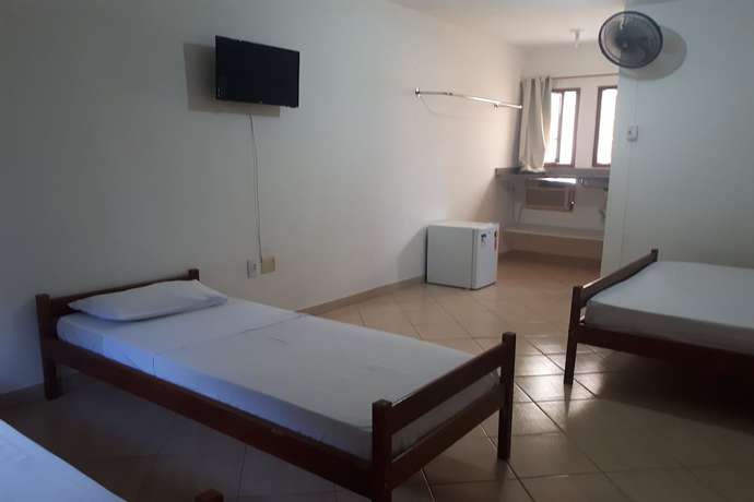 Imagen de la habitación del Hotel OYO Pousada Para&iacute;so. Foto 12