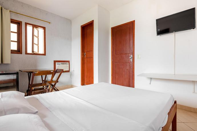Imagen de la habitación del Hotel OYO Pousada Para&iacute;so. Foto 14