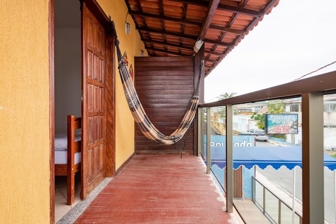 Imagen de la habitación del Hotel OYO Pousada Para&iacute;so. Foto 15