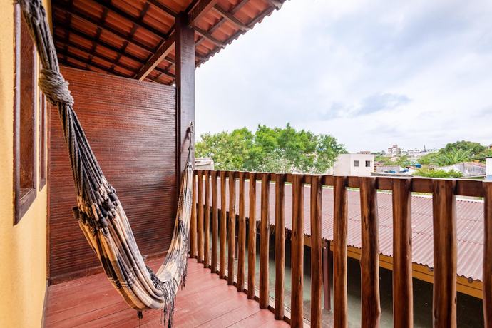 Imagen de la habitación del Hotel OYO Pousada Para&iacute;so. Foto 18