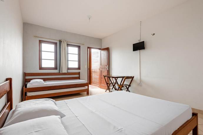 Imagen de la habitación del Hotel OYO Pousada Para&iacute;so. Foto 19