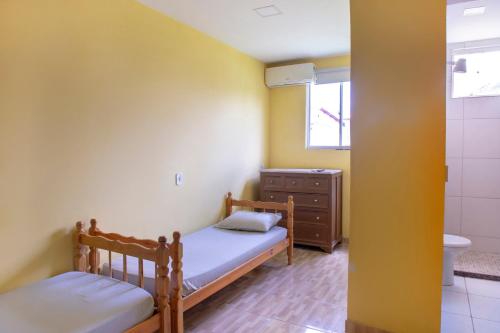 Imagen de la habitación del Hotel OYO Pousada Simone. Foto 18