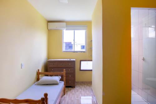 Imagen de la habitación del Hotel OYO Pousada Simone. Foto 19