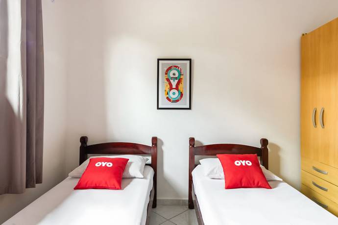 Imagen de la habitación del Hotel OYO Pousada Tia L&eacute;o Campinas, Bar&atilde;o Geraldo. Foto 3