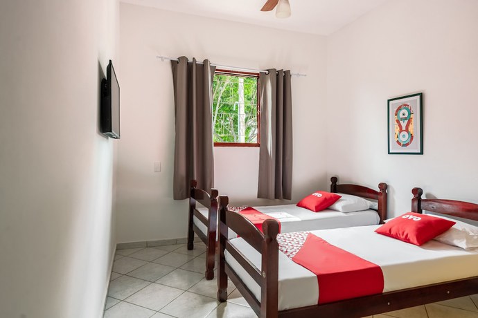 Imagen de la habitación del Hotel OYO Pousada Tia L&eacute;o Campinas, Bar&atilde;o Geraldo. Foto 7