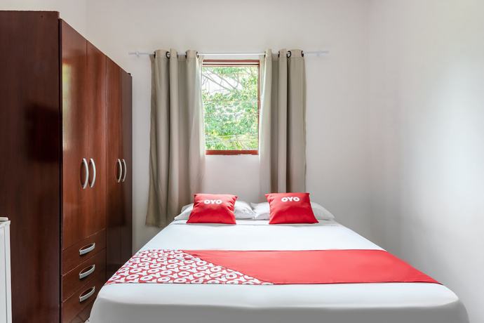 Imagen de la habitación del Hotel OYO Pousada Tia L&eacute;o Campinas, Bar&atilde;o Geraldo. Foto 8