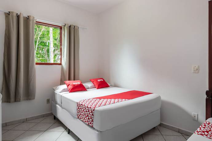 Imagen de la habitación del Hotel OYO Pousada Tia L&eacute;o Campinas, Bar&atilde;o Geraldo. Foto 9