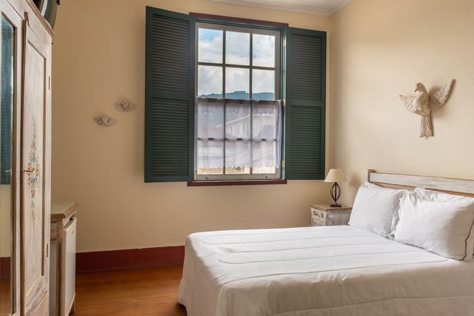 Imagen de la habitación del Hotel OYO Pousada do Duque. Foto 9