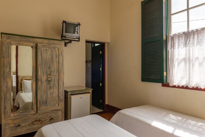 Imagen de la habitación del Hotel OYO Pousada do Duque. Foto 12