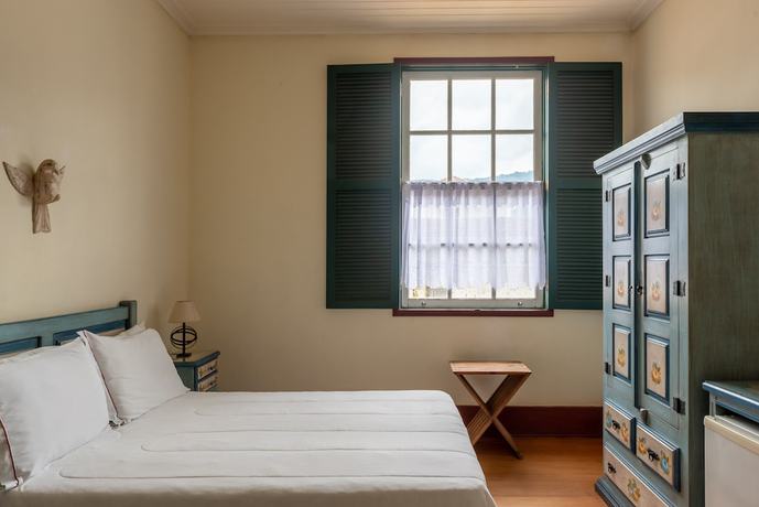 Imagen de la habitación del Hotel OYO Pousada do Duque. Foto 14