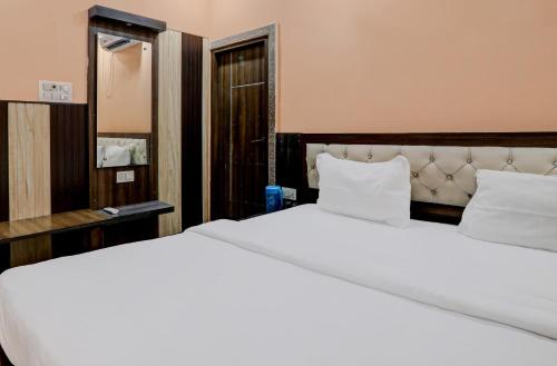 Imagen de la habitación del Hotel OYO Rameshwar. Foto 19