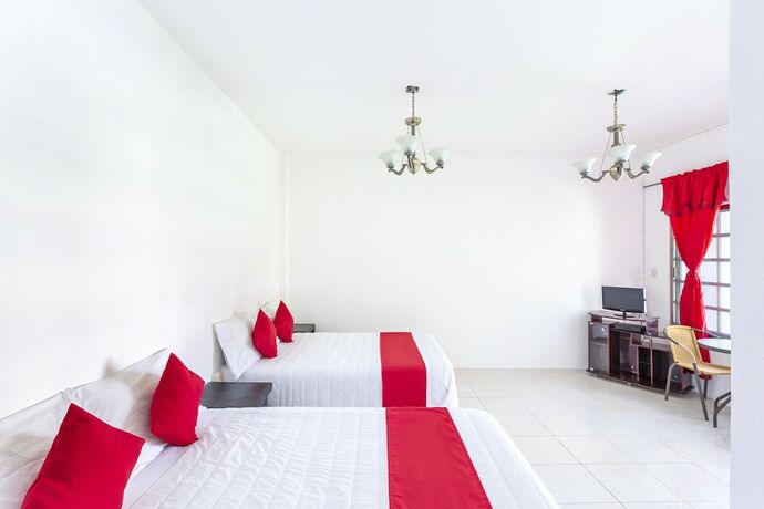 Imagen de la habitación del Hotel OYO Rio. Foto 15