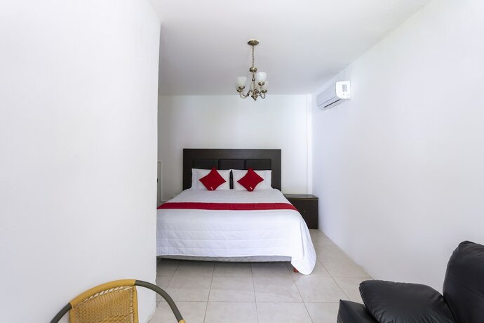 Imagen de la habitación del Hotel OYO Rio. Foto 16