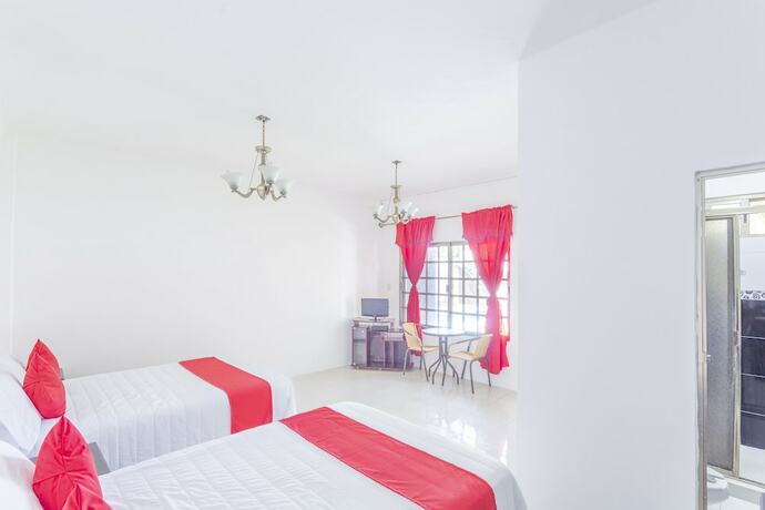 Imagen de la habitación del Hotel OYO Rio. Foto 17