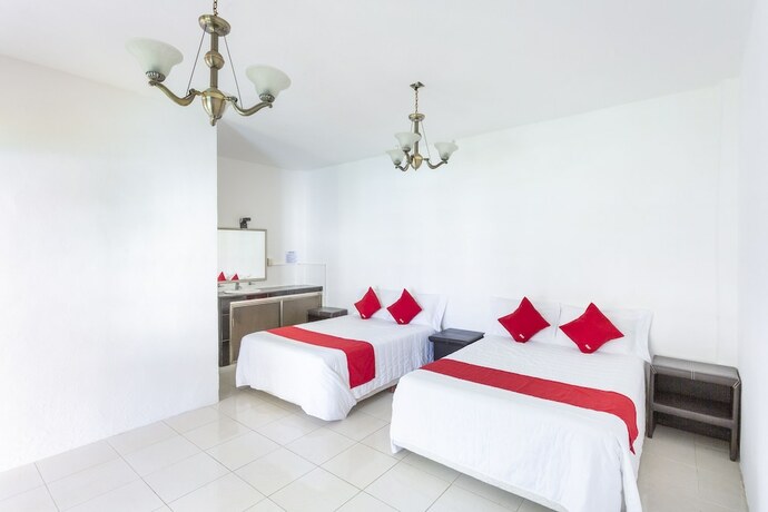 Imagen de la habitación del Hotel OYO Rio. Foto 19