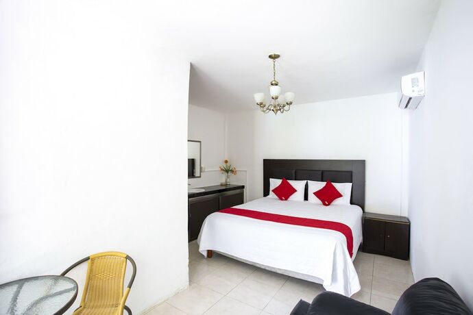 Imagen de la habitación del Hotel OYO Rio. Foto 20