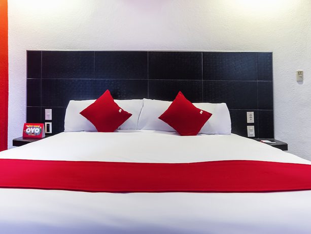 Imagen de la habitación del Hotel OYO SR92. Foto 4