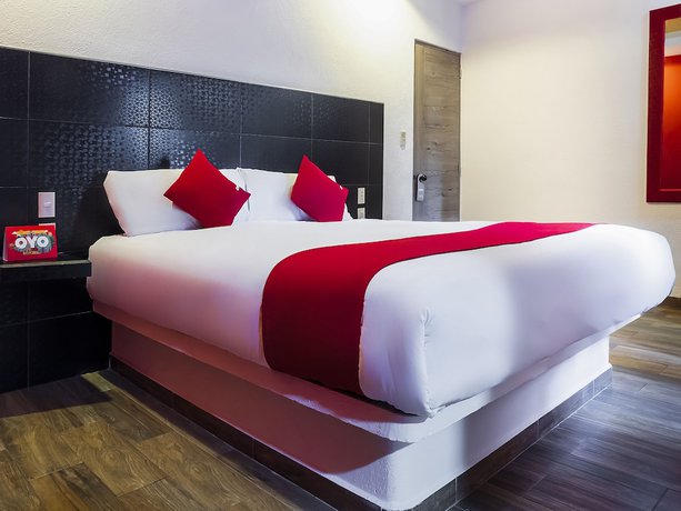 Imagen de la habitación del Hotel OYO SR92. Foto 7