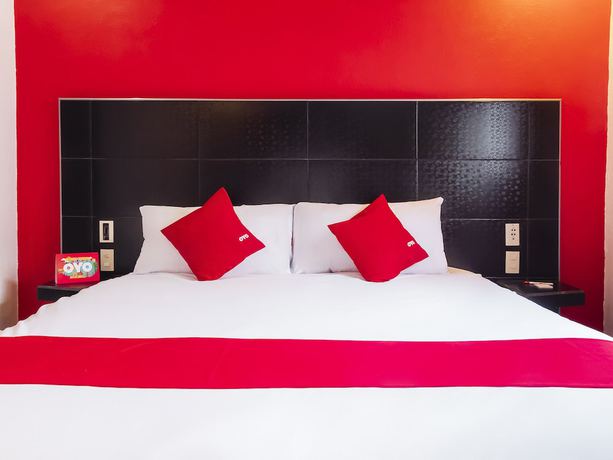 Imagen de la habitación del Hotel OYO SR92. Foto 10