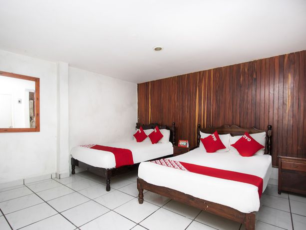 Imagen de la habitación del Hotel OYO San Carlos. Foto 10