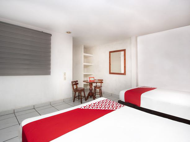 Imagen de la habitación del Hotel OYO San Carlos. Foto 14