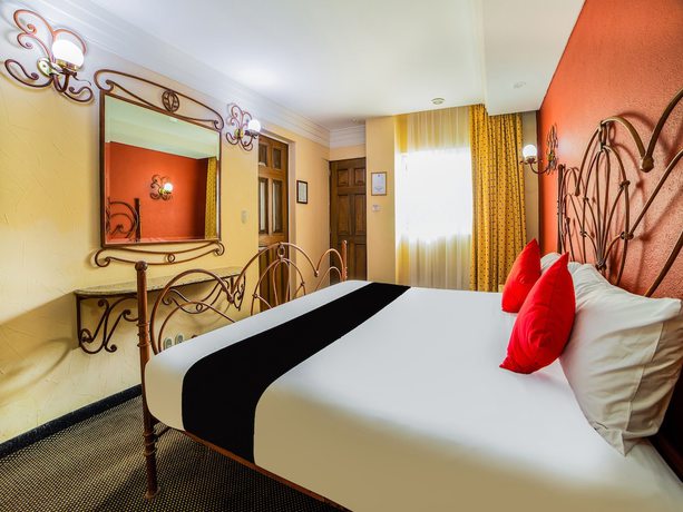 Imagen de la habitación del Hotel OYO Santa María. Foto 5