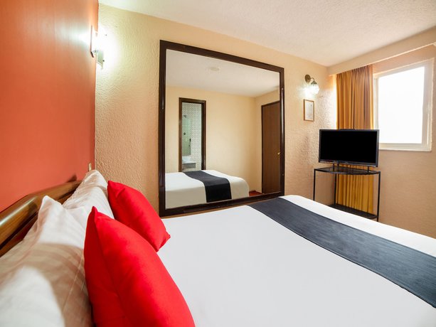 Imagen de la habitación del Hotel OYO Santa María. Foto 6