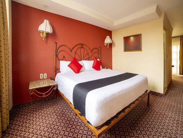 Imagen de la habitación del Hotel OYO Santa María. Foto 10